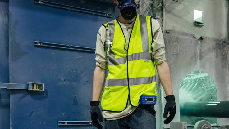 Gilian GilAir Plus personal air sampling pump worn on a worker